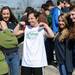 Saline student Joey Hornyak shows off his muscles as he poses for a photo with Fr. Gabriel Richard juniors Anne Weitzel, Samantha Lanzetta, and Kelly Barletta. Father Gabriel Richard hosted dozens of Washtenaw County Special Olympic athletes for a field day of events at the school. Melanie Maxwell I AnnArbor.com
